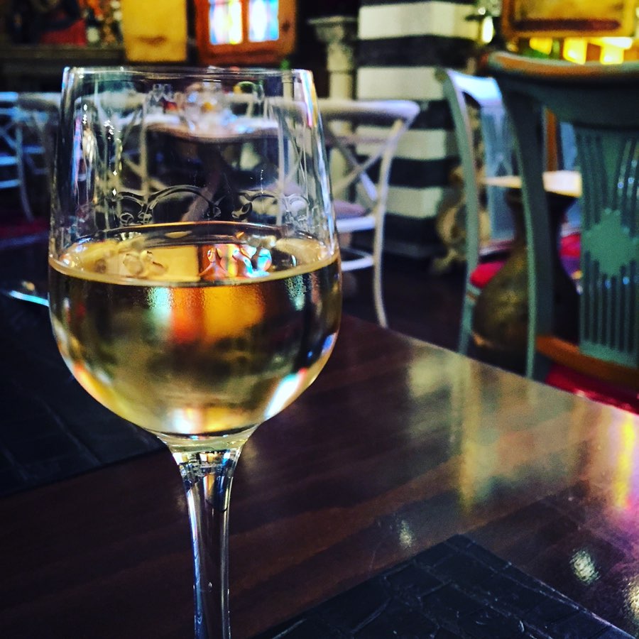 A glass of Rakija on a bar table in Belgrade